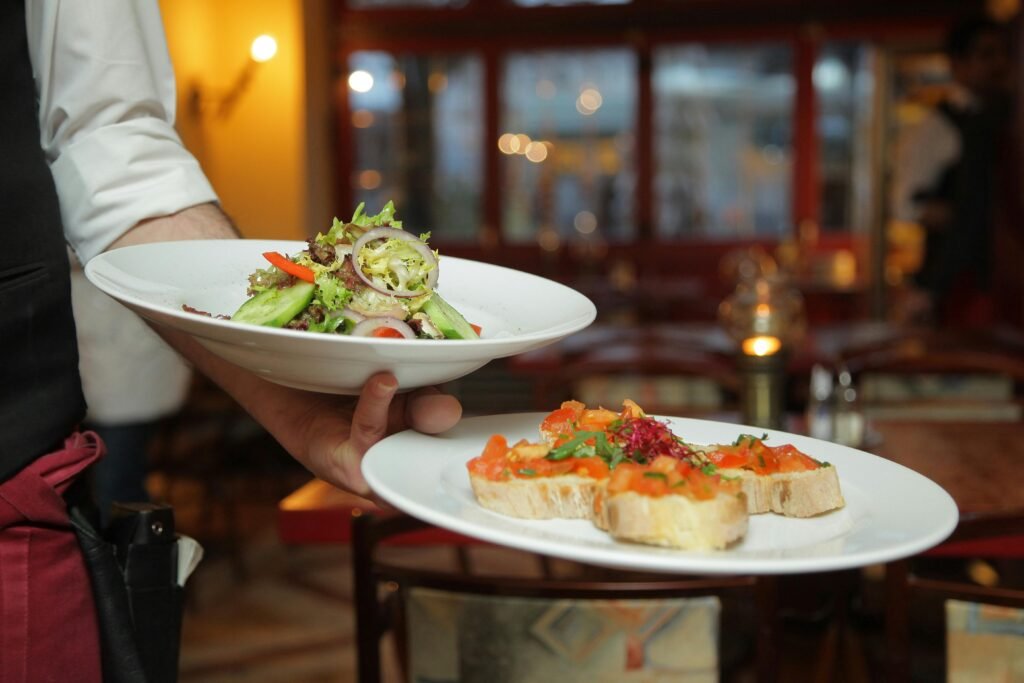 a man holding a plate of food