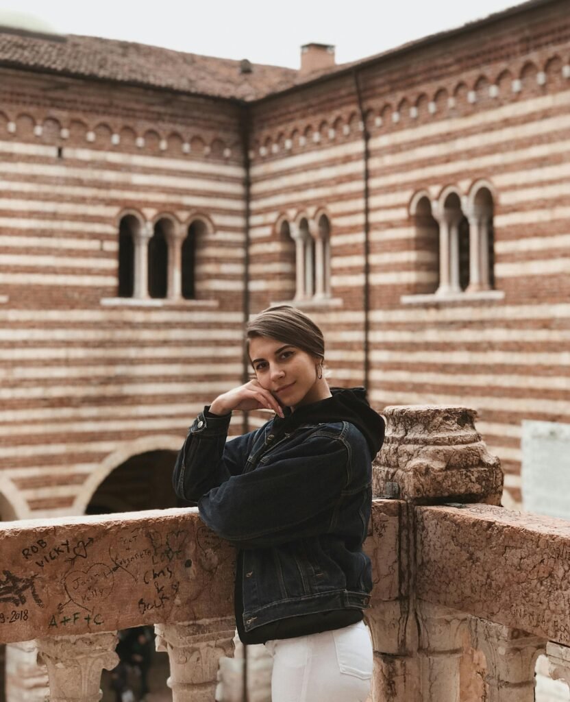 a girl stand in Juliets Balcony