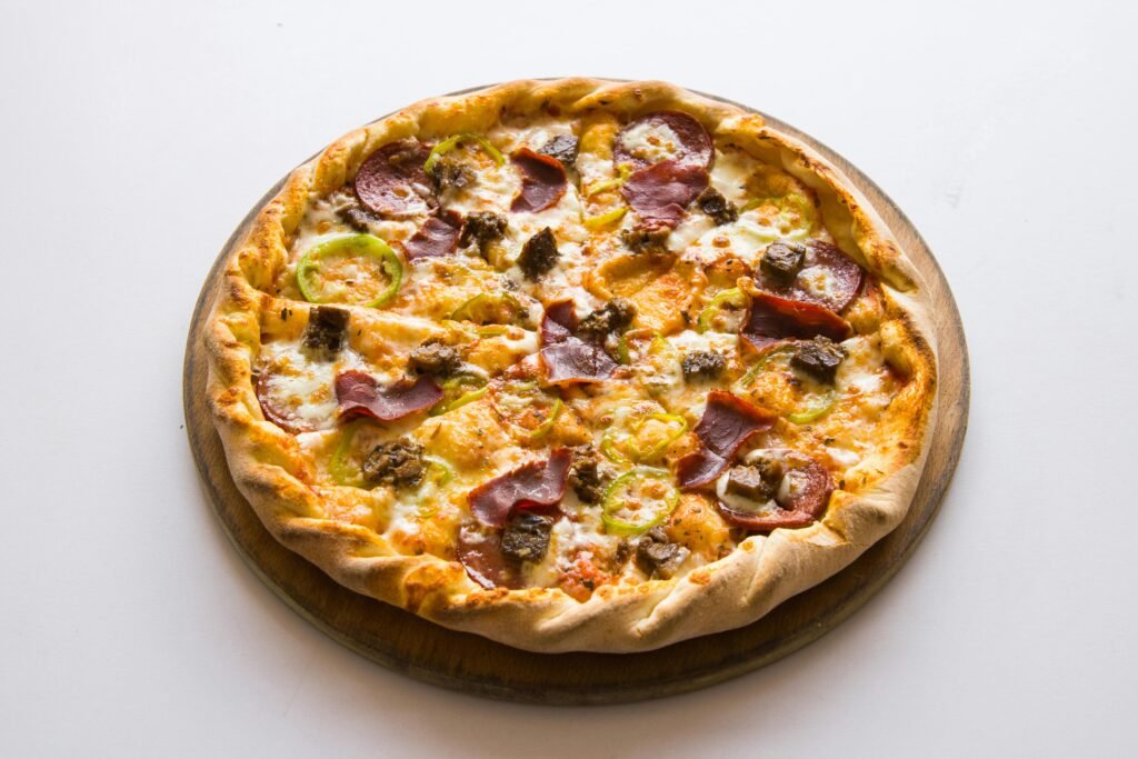Pizza on Wooden Board