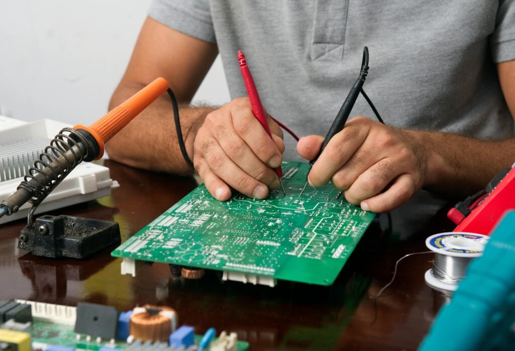 Technician Repairing an Electronic Device